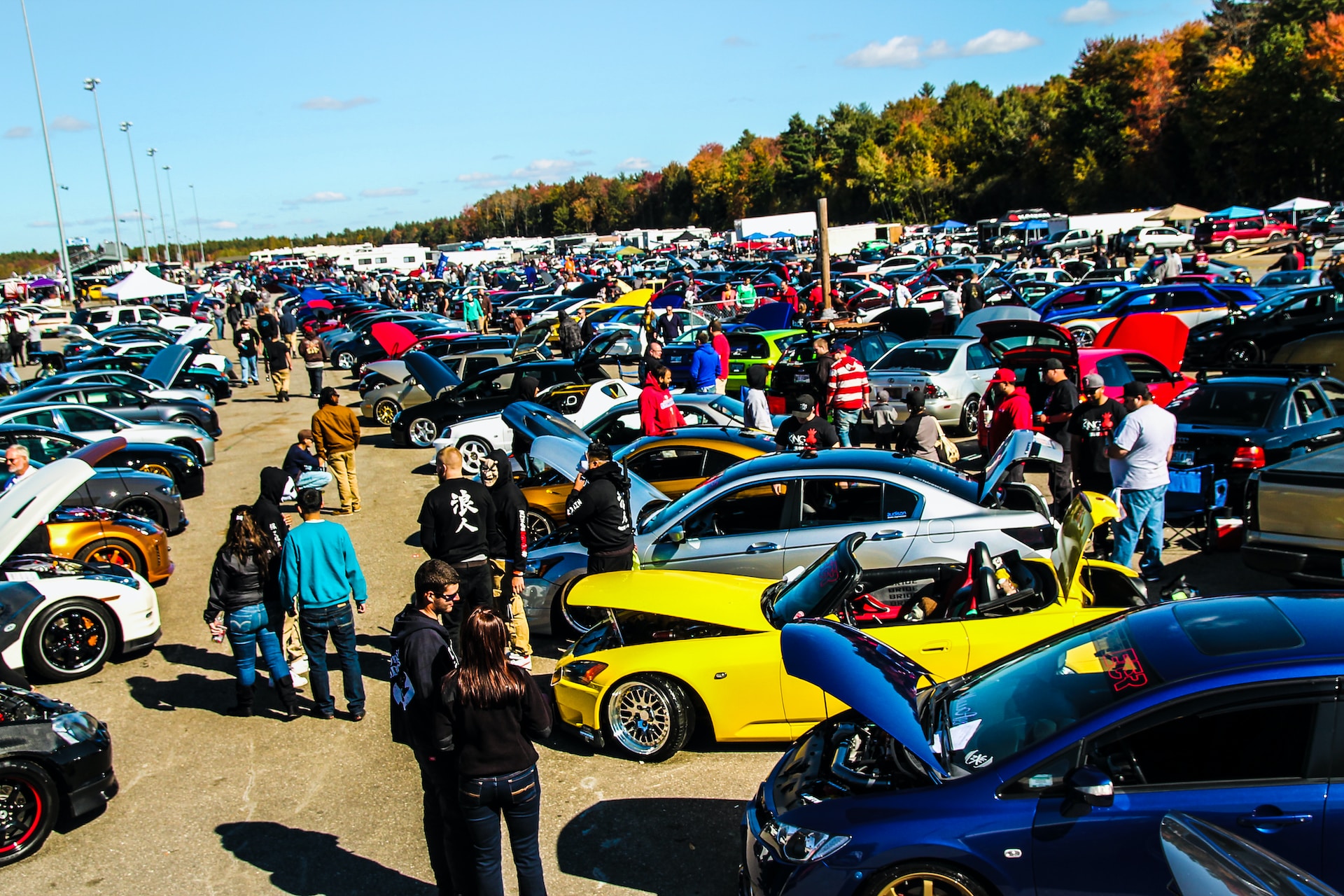 A parking lot full of tuned cars